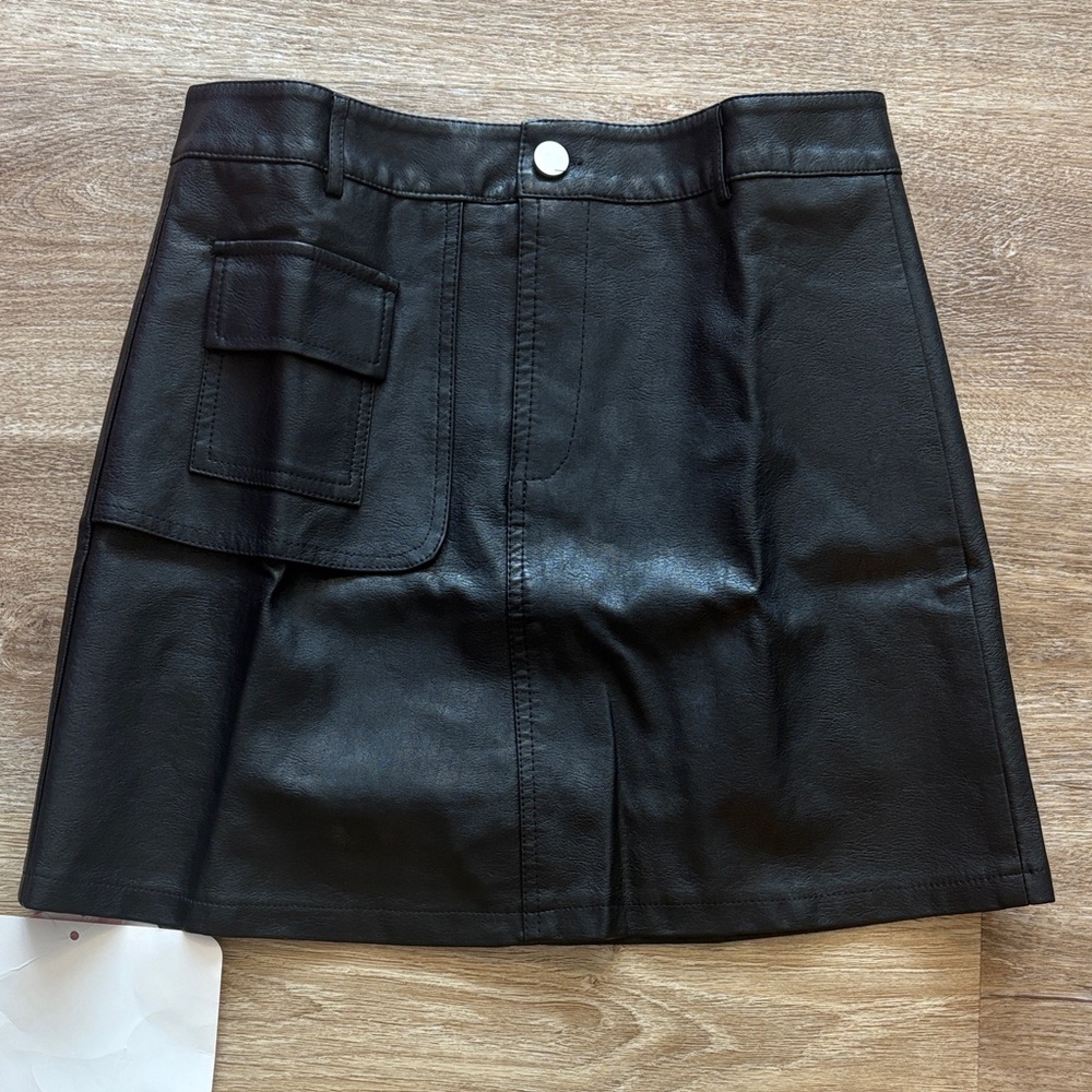 Chicwish Black Faux Leather Mini Skirt With Pocket - lined with shorts.